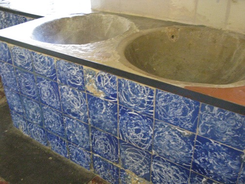 Ancient earthen sinks with tile facings.