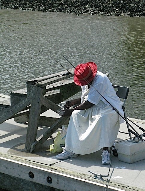 A local fishing on the pier.